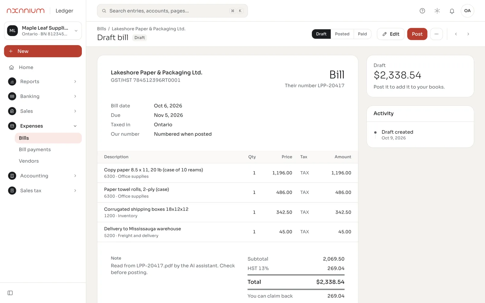 A supplier bill read from a PDF by the AI assistant, with HST and accounts filled in